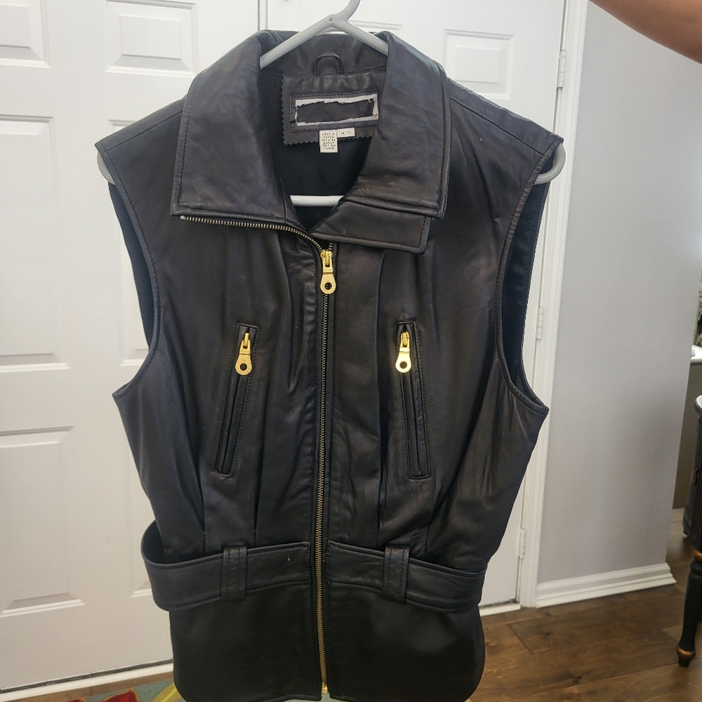 Leather vest with gold hardware
